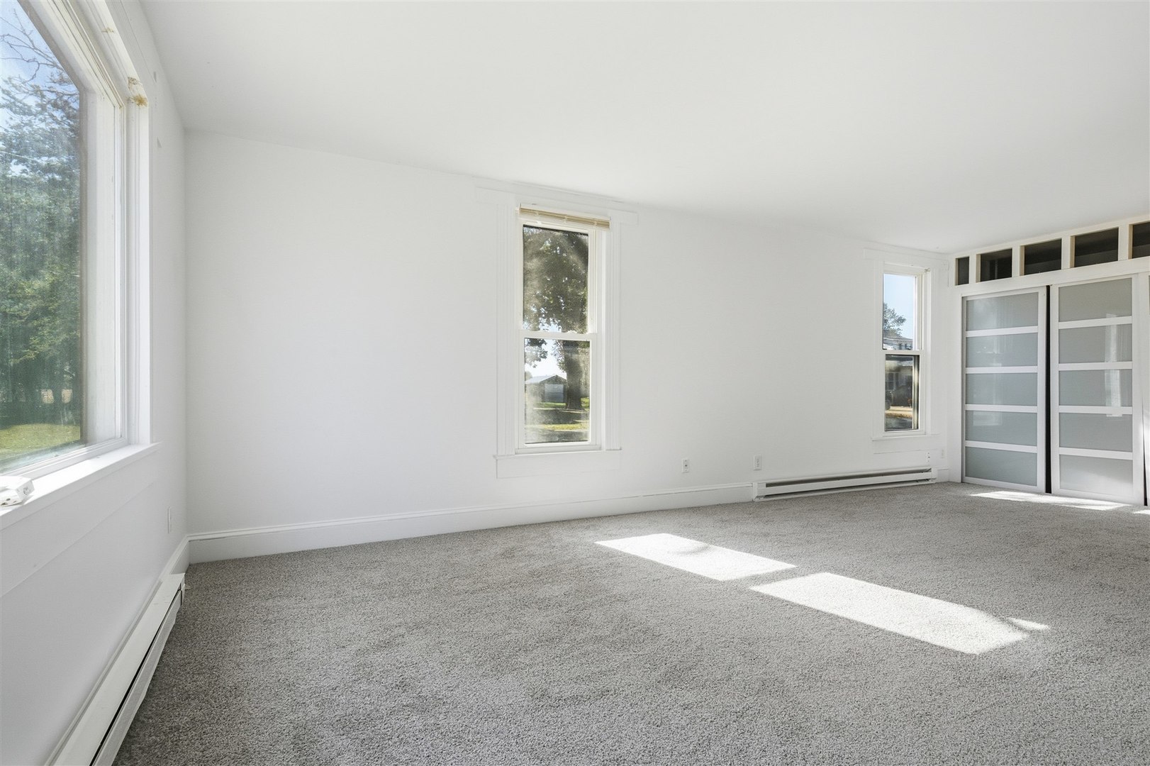 305 South Perry Street Carlock, IL 61725 - Photo 10 of 30 an empty room with a window