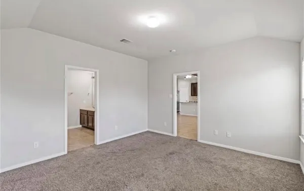 a bathroom with a double vanity sink mirror and shower