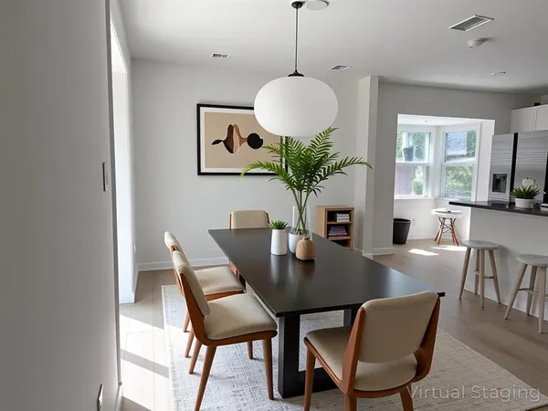a dining room with furniture a window and a chandelier