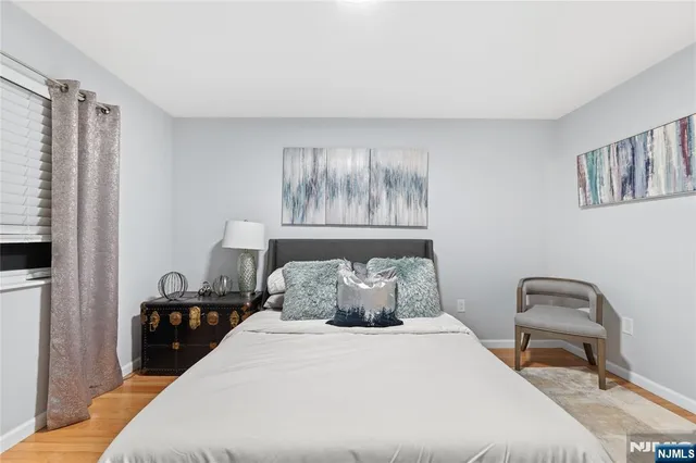 a view of a bedroom and bathroom