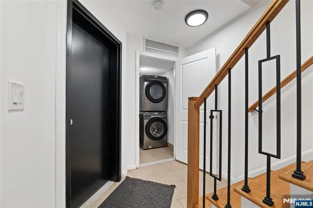 a view of a patio with table and chairs with wooden fence and floor