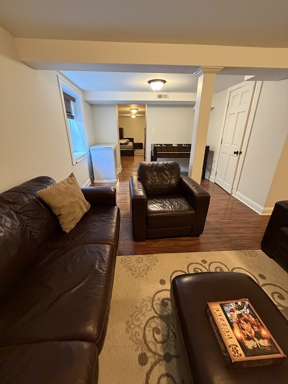 17 Cardinal Street, Unit 17 Winchester, MA 01890 - Photo 32 of 42 a living room with furniture