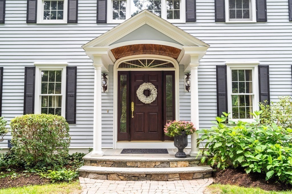 11 Equestrian Drive North Reading, MA 01864 - Photo 2 of 41 a front view of a house with garden