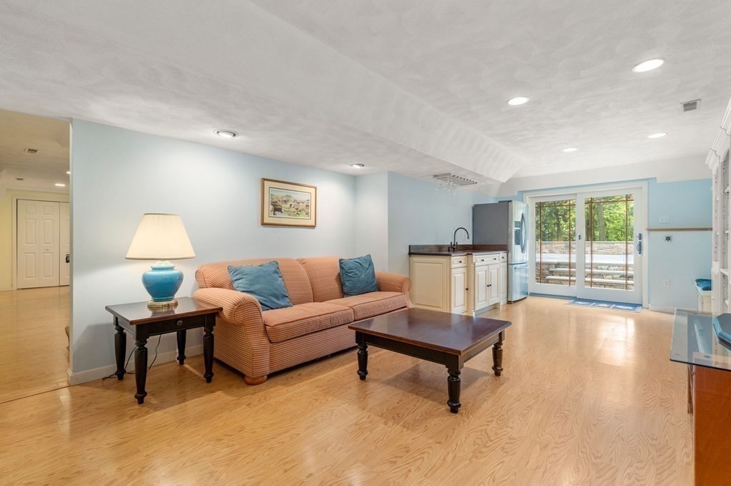 11 Equestrian Drive North Reading, MA 01864 - Photo 23 of 41 a living room with furniture and a large window