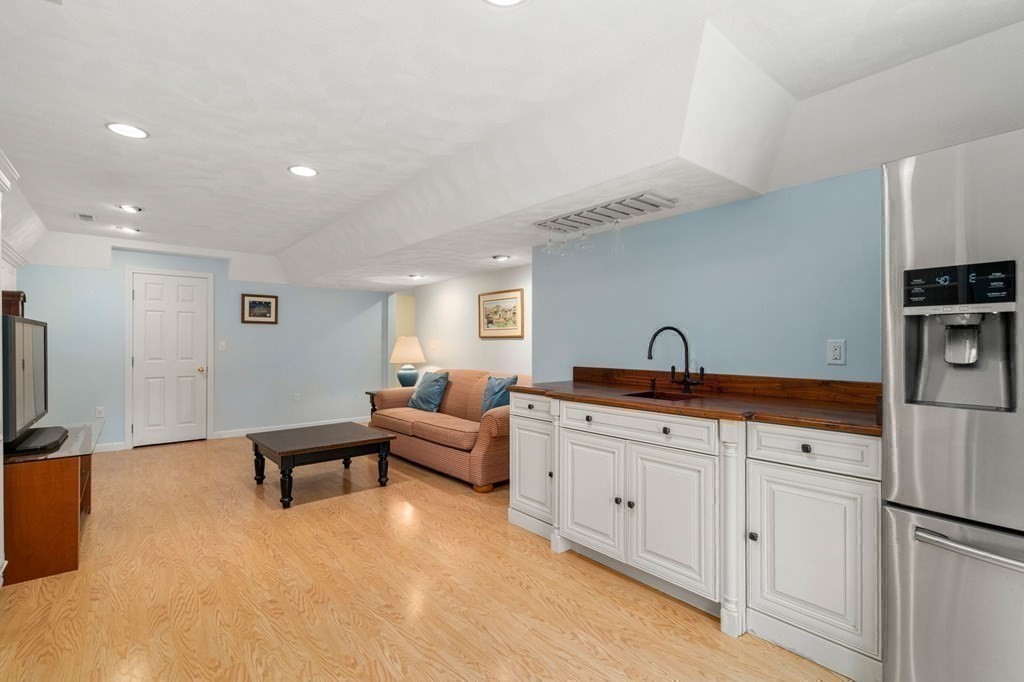 11 Equestrian Drive North Reading, MA 01864 - Photo 24 of 41 a spacious bathroom with a double vanity sink and a mirror