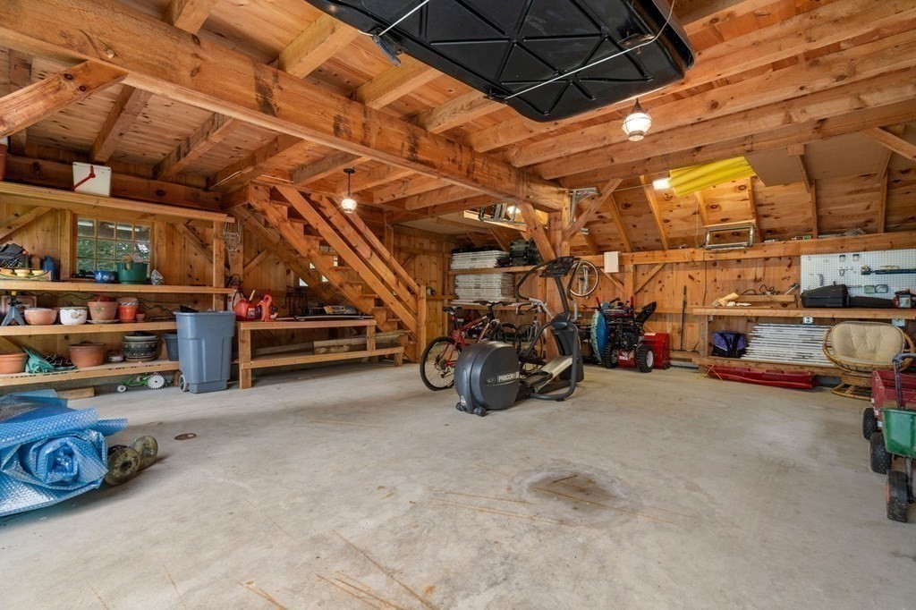 11 Equestrian Drive North Reading, MA 01864 - Photo 27 of 41 a view of parking garage with cars