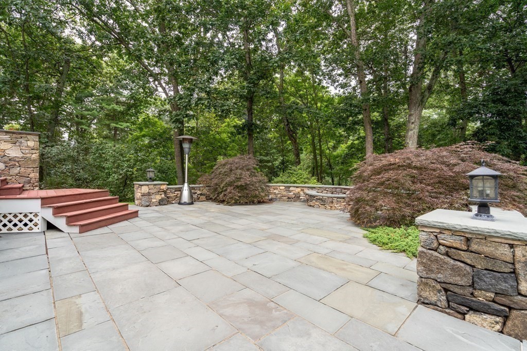 11 Equestrian Drive North Reading, MA 01864 - Photo 33 of 41 a backyard of a house with seating space