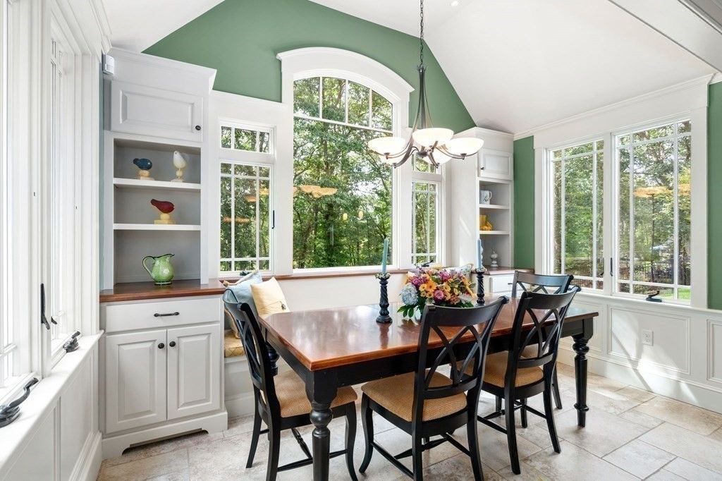 11 Equestrian Drive North Reading, MA 01864 - Photo 7 of 41 a dining room with furniture a chandelier and wooden floor