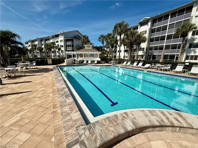 a view of a lake with a building in the background