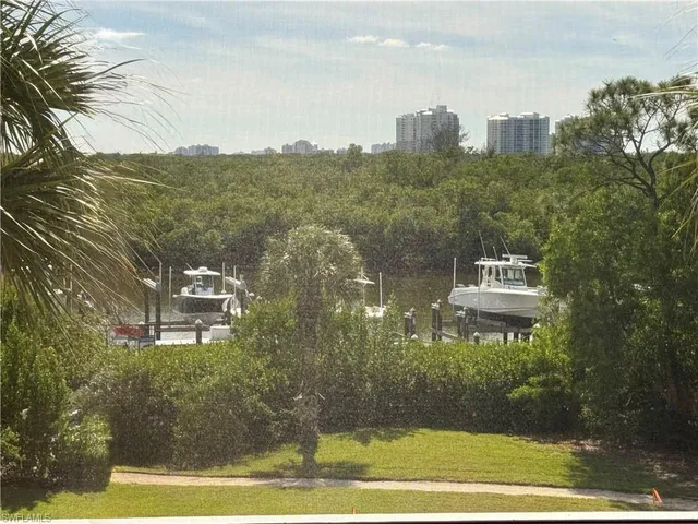 a view of a lake from a balcony