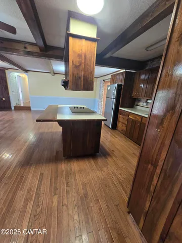 a view of furniture and wooden floor