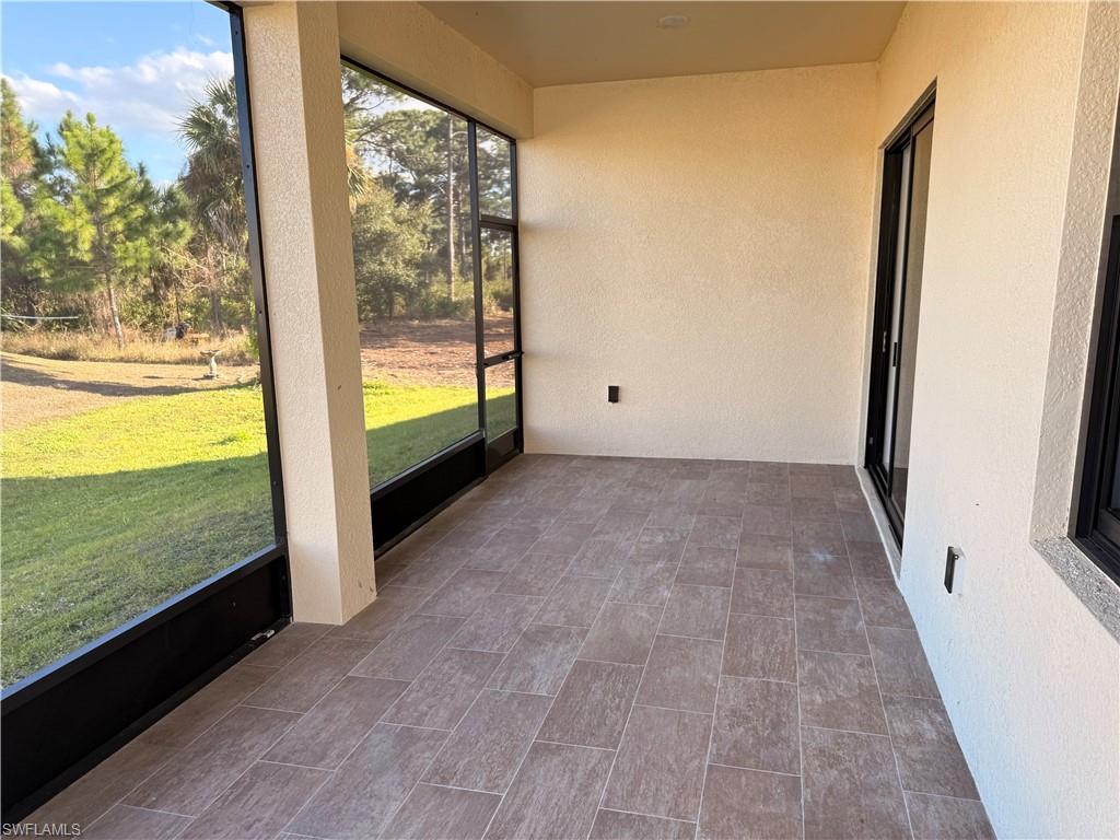 941 Columbus Boulevard Lehigh Acres, FL 33974 - Photo 25 of 41 a view of an empty room and window