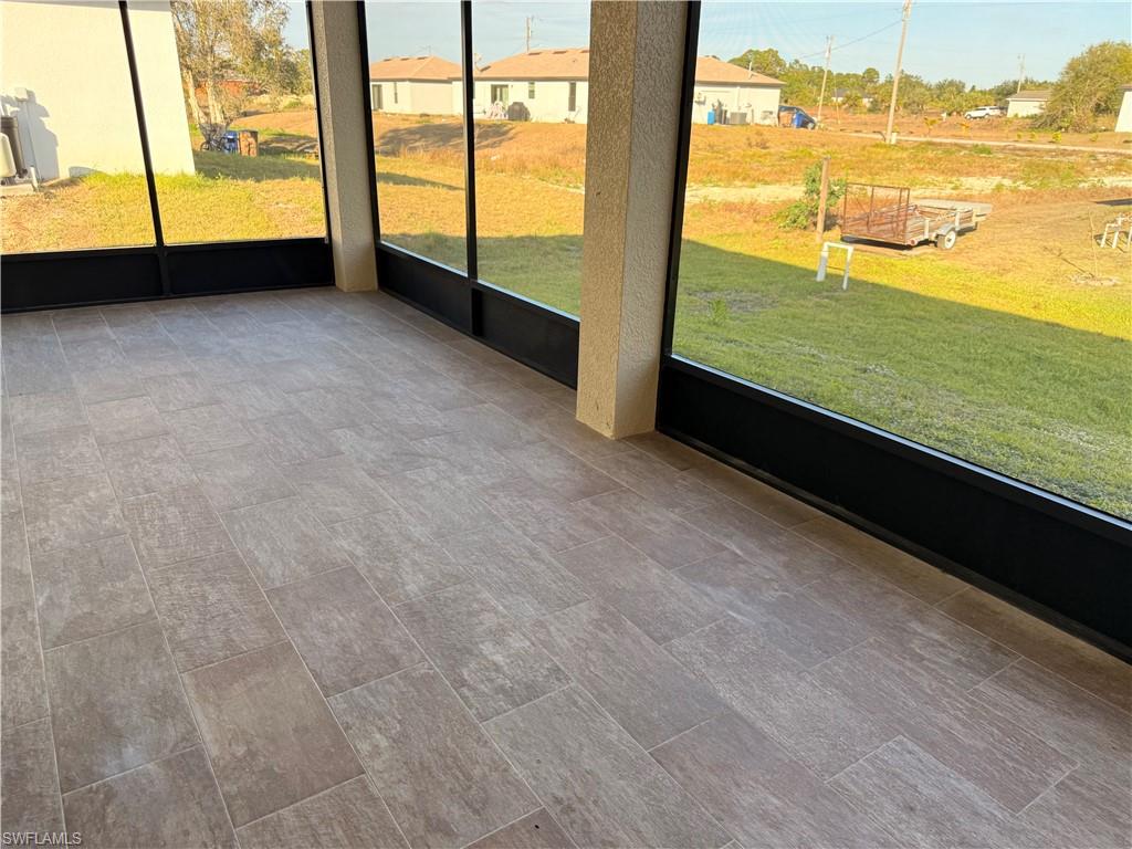 941 Columbus Boulevard Lehigh Acres, FL 33974 - Photo 8 of 41 a view of an ocean from a balcony