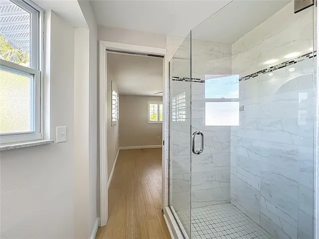 a view of walk in closet with window