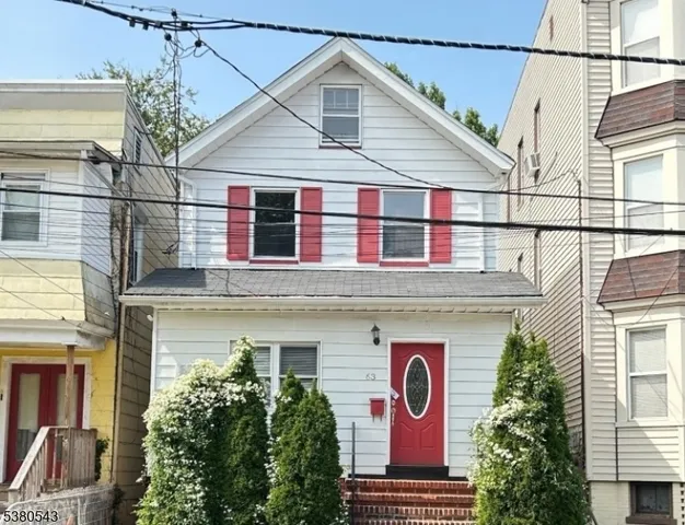 a view of a house with a garage