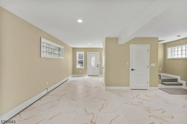 a view of livingroom with hardwood floor and bedroom