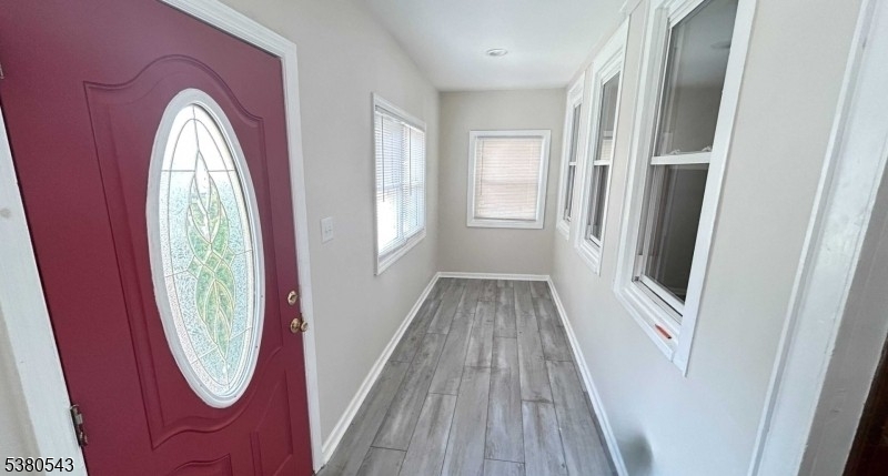 63 Maple Avenue Irvington, NJ 07111 - Photo 18 of 28 a view of a livingroom with wooden floor