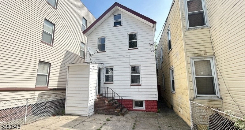 63 Maple Avenue Irvington, NJ 07111 - Photo 28 of 28 a view of a house with a sink