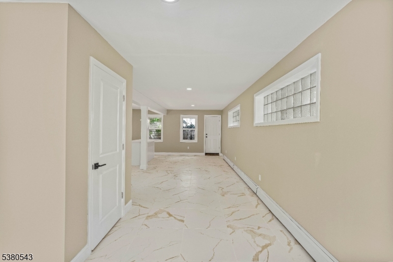 63 Maple Avenue Irvington, NJ 07111 - Photo 4 of 28 a view of an empty room