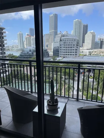 a view of a balcony with city view