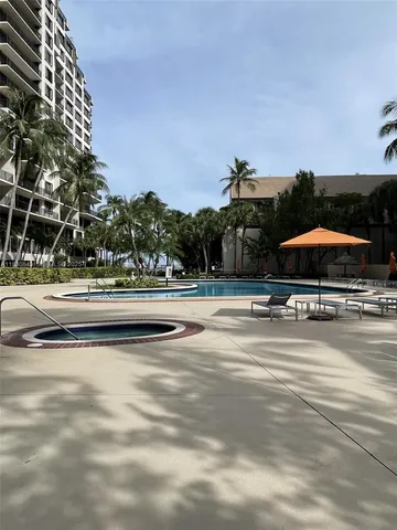 a view of street with houses and trees
