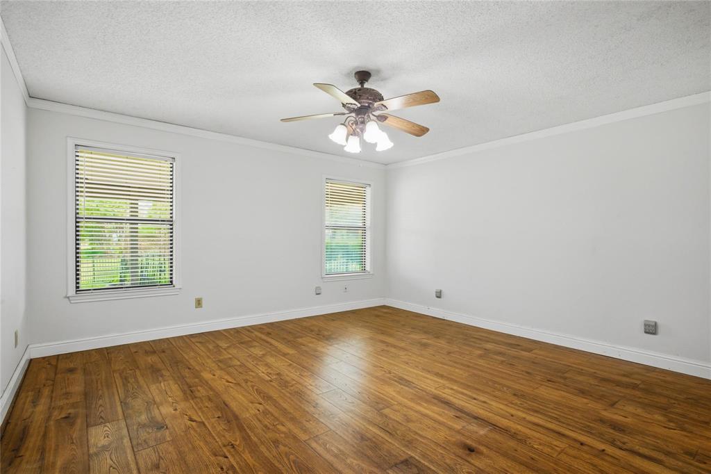 265 East Dove Road Southlake, TX 76092 - Photo 23 of 39 wooden floor in an empty room with a window
