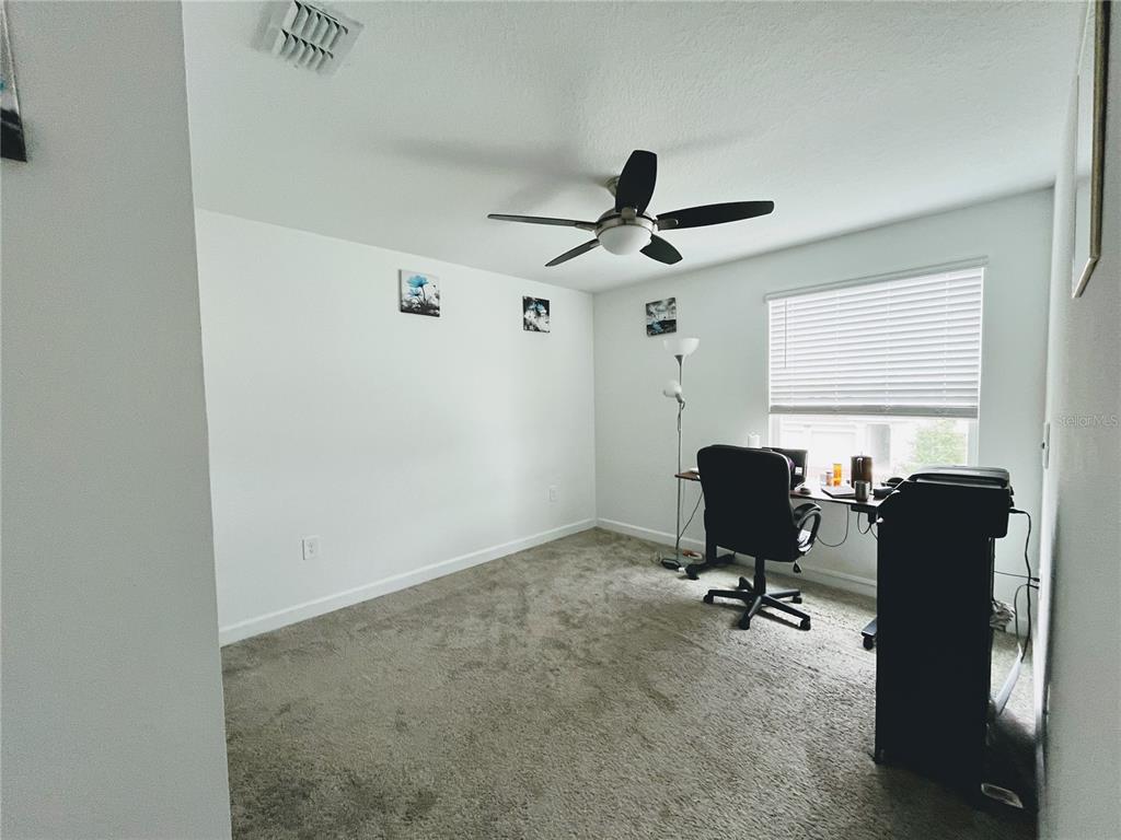 11498 Rhyme Avenue Orlando, FL 32832 - Photo 15 of 17 a view of workspace with windows