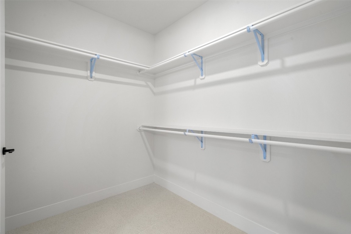 1701 Simond Avenue, Unit 206 Austin, TX 78723 - Photo 11 of 37 a view of an empty walk in closet