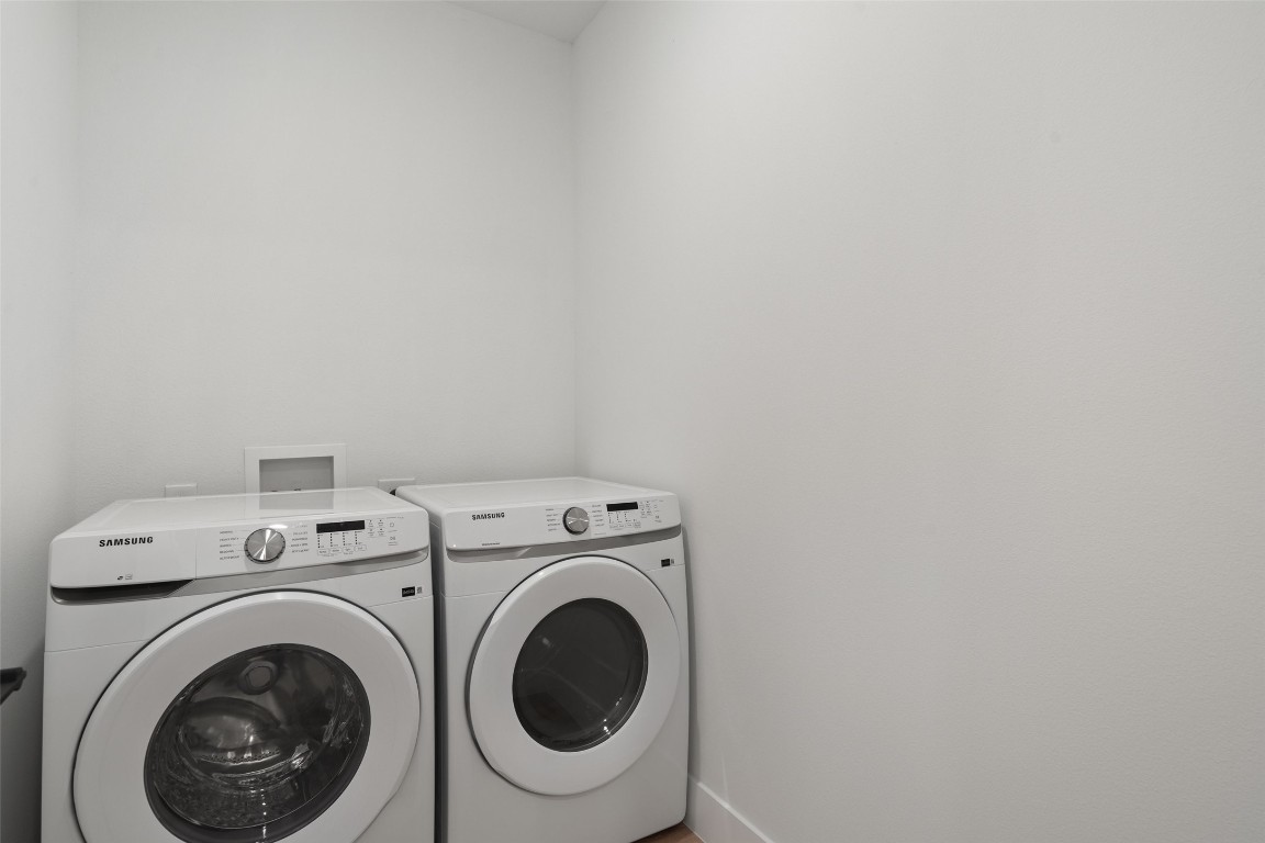 1701 Simond Avenue, Unit 206 Austin, TX 78723 - Photo 13 of 37 a utility room with dryer and washer