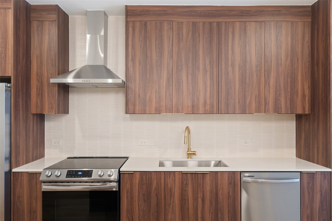 1701 Simond Avenue, Unit 206 Austin, TX 78723 - Photo 2 of 37 a kitchen with a stove and a sink