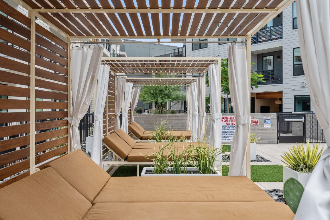 1701 Simond Avenue, Unit 206 Austin, TX 78723 - Photo 21 of 37 a view of balcony with couch