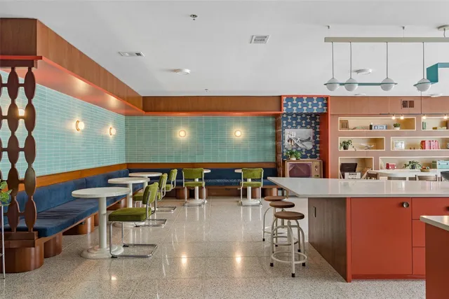 a outdoor space with lots of tables and chairs