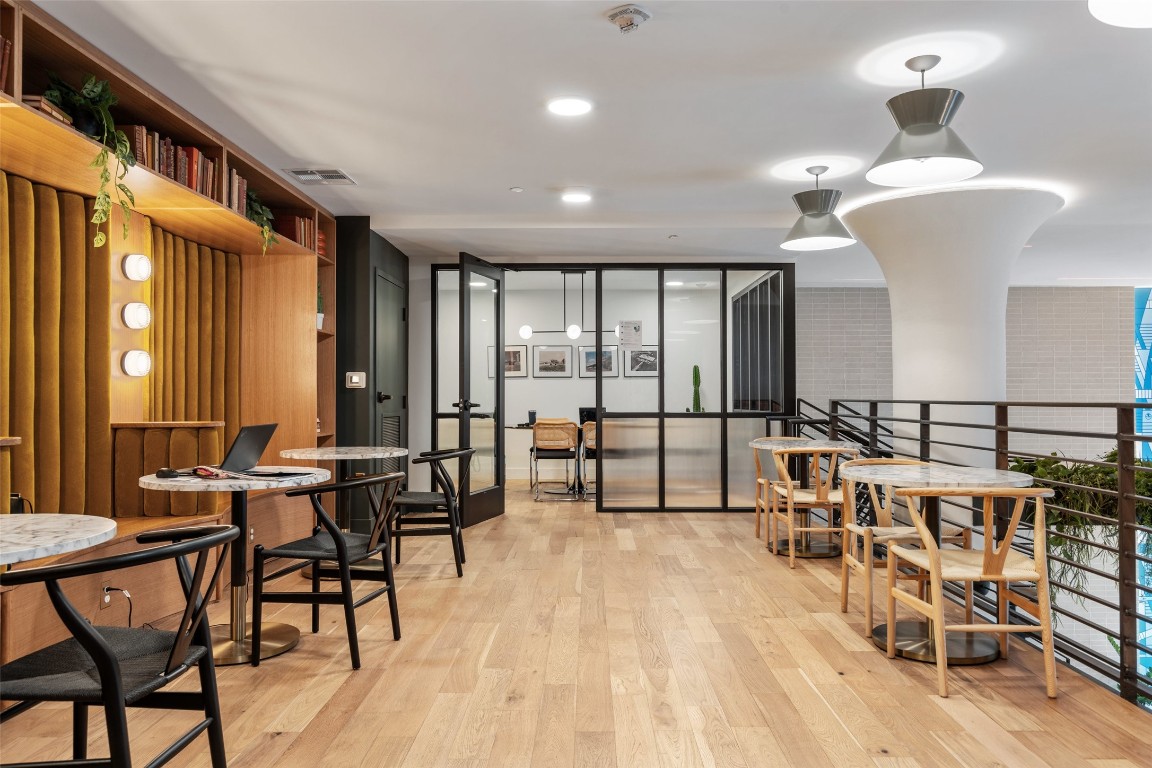 1701 Simond Avenue, Unit 206 Austin, TX 78723 - Photo 30 of 37 a view of a a dining room with furniture window and wooden floor