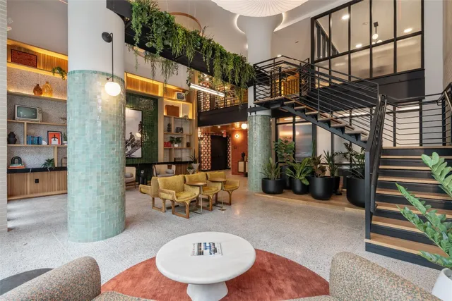 a outdoor space with patio furniture and a potted plant