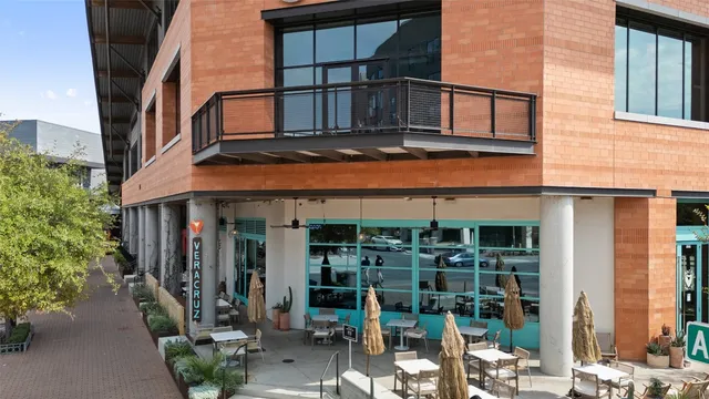 a view of a building with sitting area