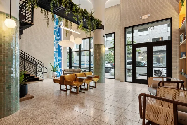 a view of empty room with a door