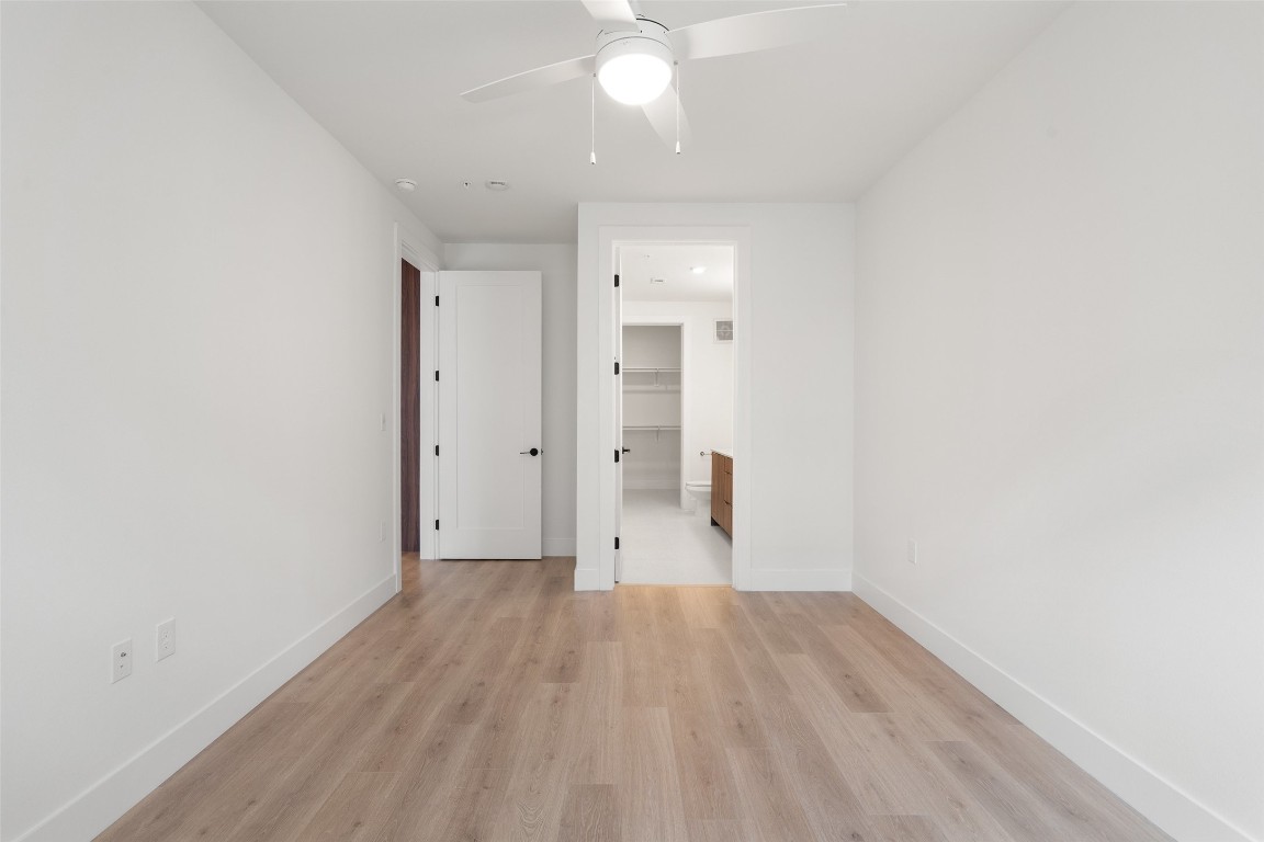 1701 Simond Avenue, Unit 206 Austin, TX 78723 - Photo 9 of 37 a view of a room with wooden floor