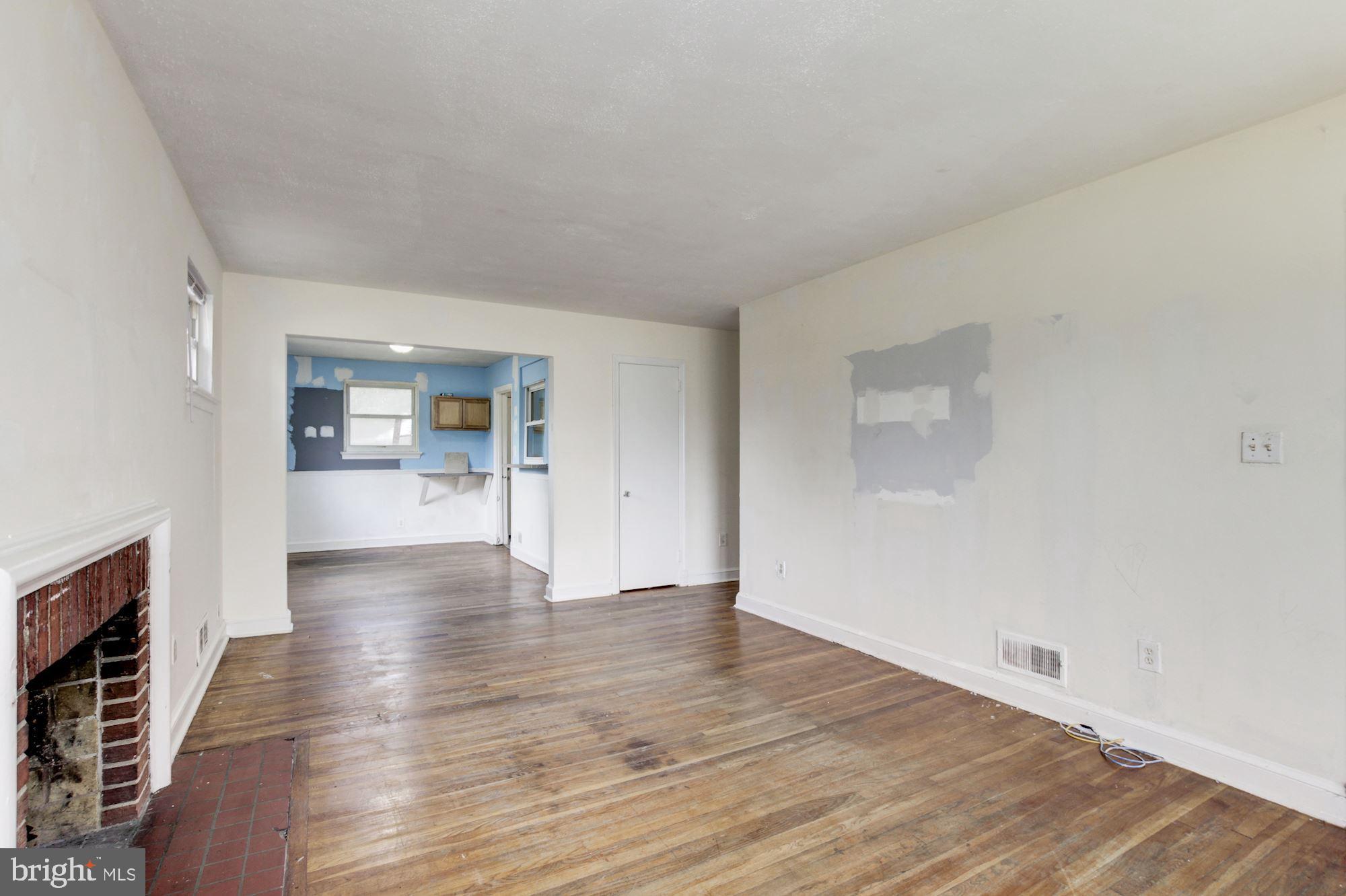 8537 Riggs Road Hyattsville, MD 20783 - Photo 10 of 31 Living Room & Dining Room