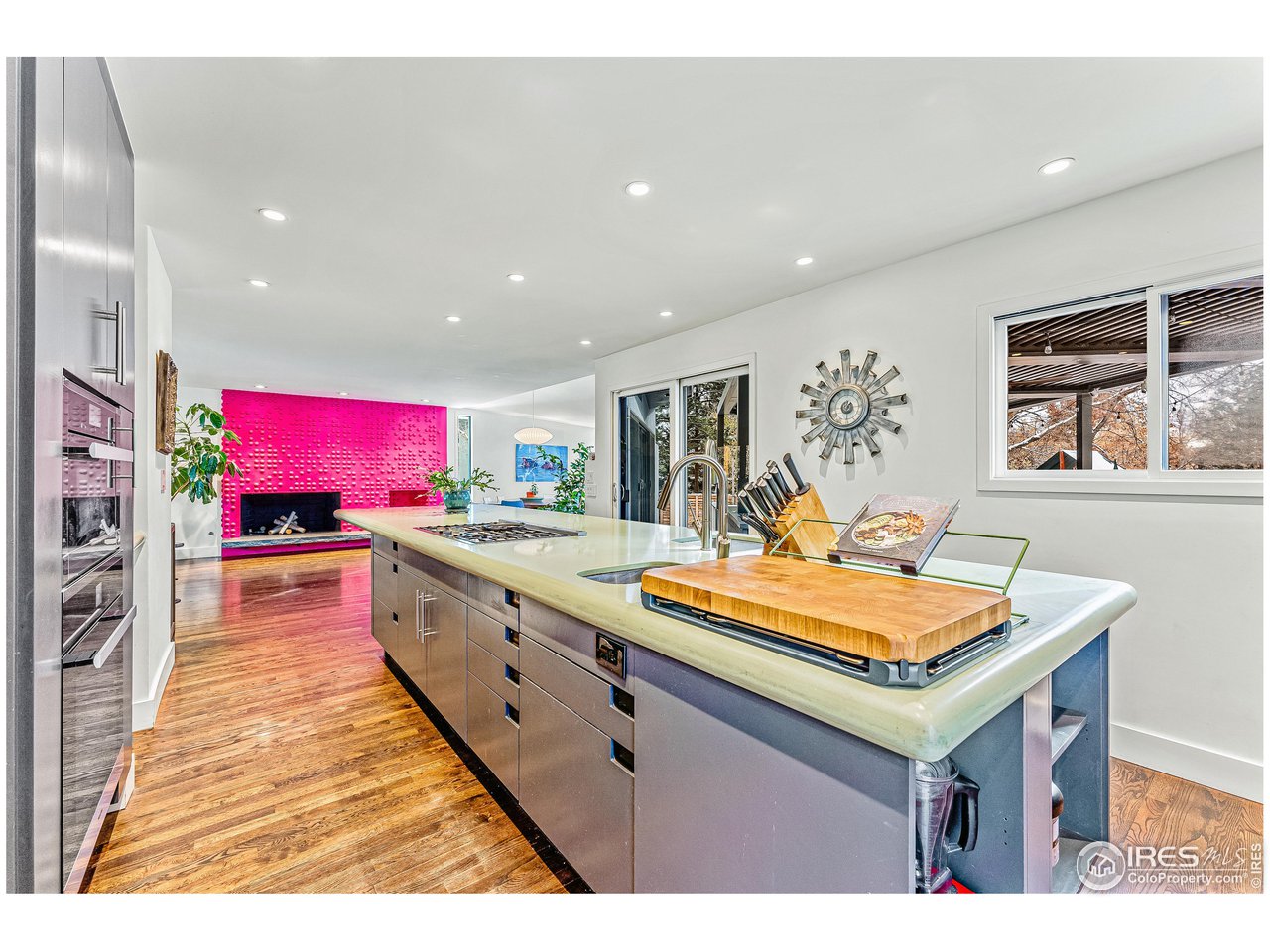 3560 9th Street Boulder, CO 80304 - Photo 15 of 39 a kitchen with stainless steel appliances kitchen island granite countertop a stove a sink and a refrigerator