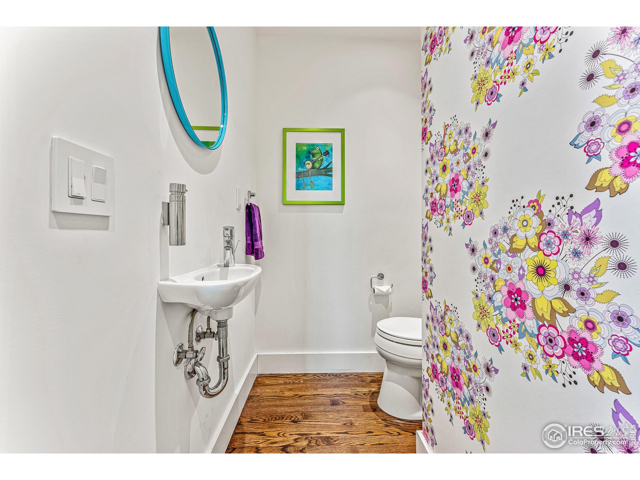 3560 9th Street Boulder, CO 80304 - Photo 18 of 39 a bathroom with a sink mirror vanity and toilet