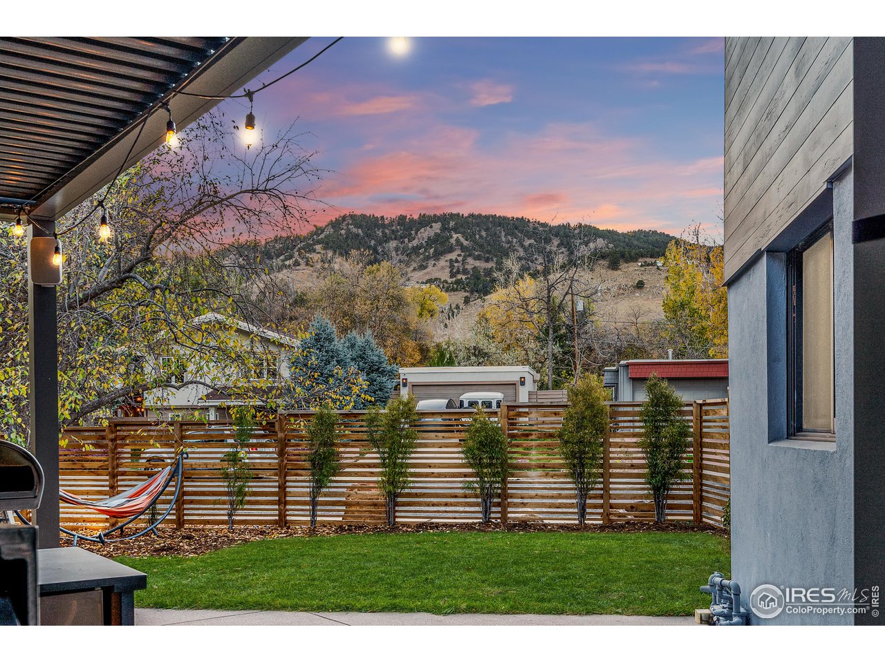 3560 9th Street Boulder, CO 80304 - Photo 2 of 39 a view of a brick house with a yard