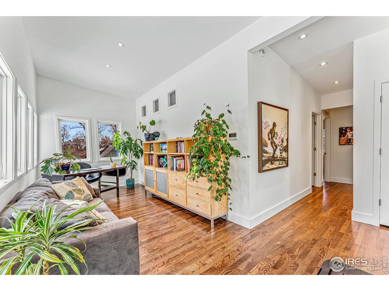 3560 9th Street Boulder, CO 80304 - Photo 21 of 39 a living room with furniture and wooden floor