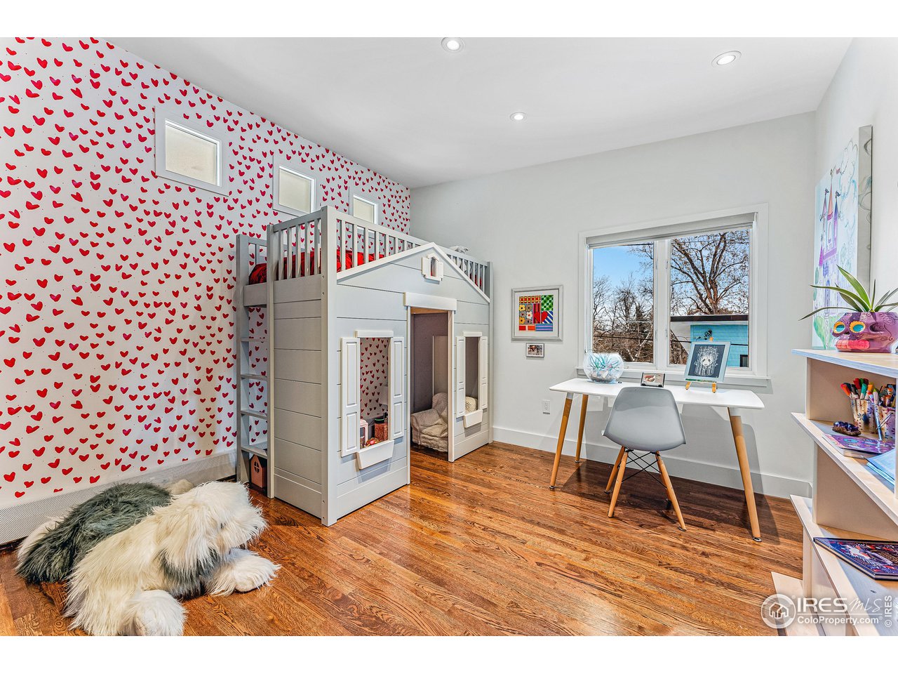 3560 9th Street Boulder, CO 80304 - Photo 26 of 39 a living room with furniture and a wooden floor