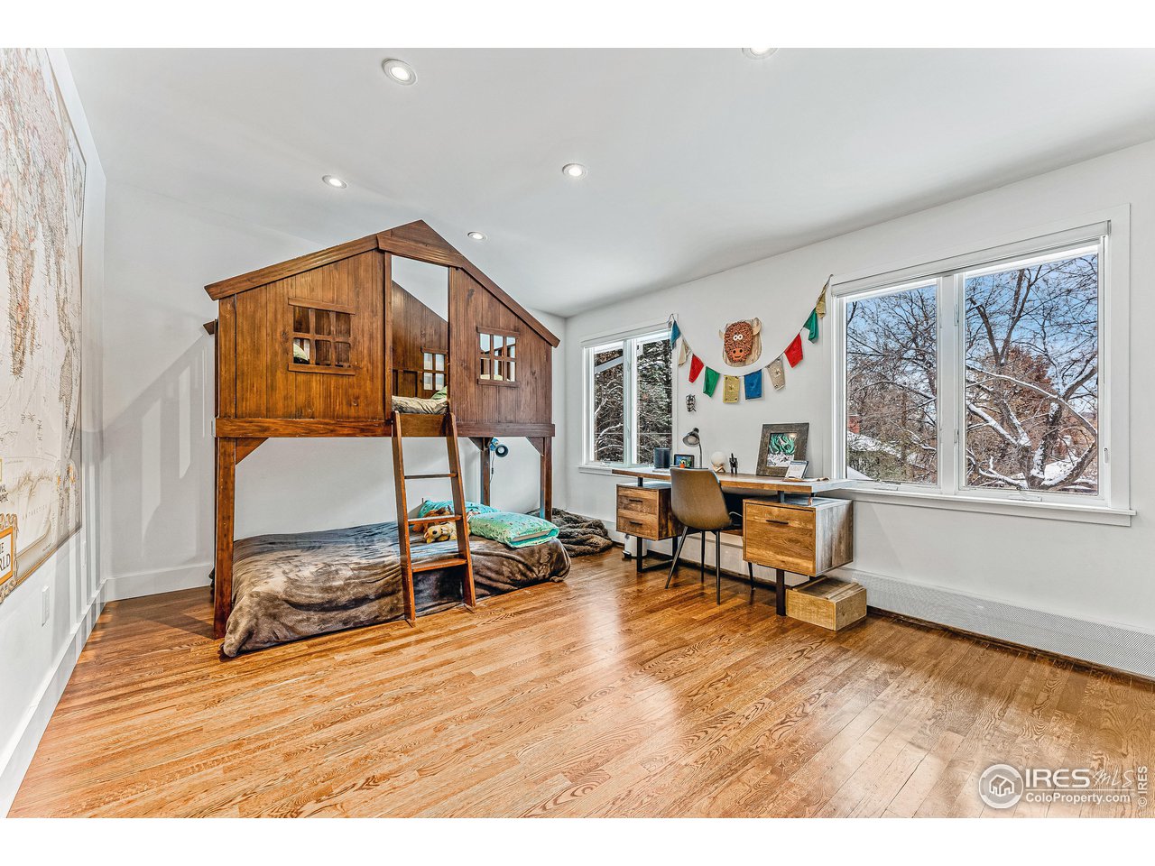 3560 9th Street Boulder, CO 80304 - Photo 27 of 39 a living room with furniture and a wooden floor