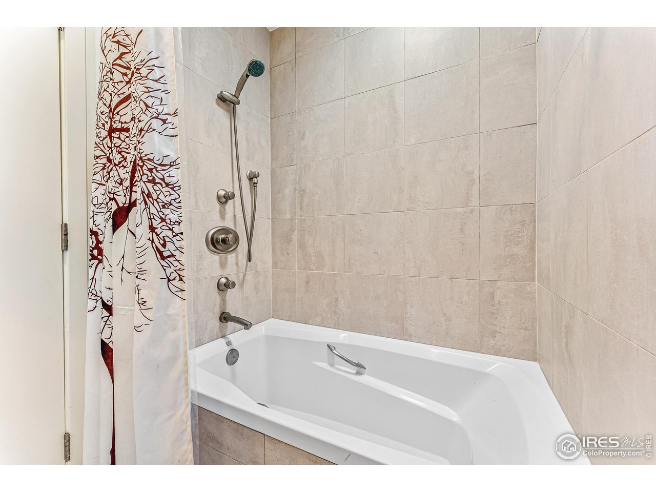 3560 9th Street Boulder, CO 80304 - Photo 28 of 39 a bathroom with a bathtub and shower