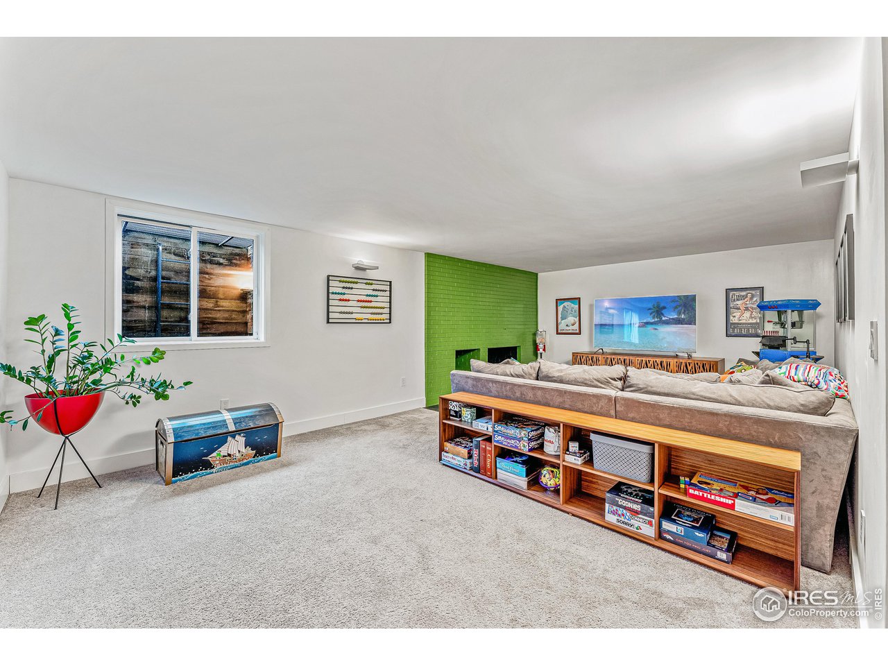 3560 9th Street Boulder, CO 80304 - Photo 30 of 39 a living room with furniture and a potted plant
