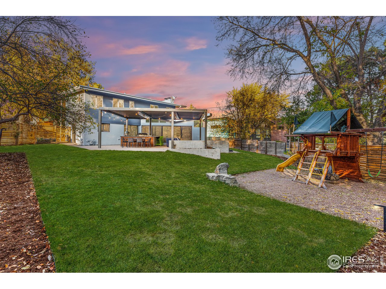 3560 9th Street Boulder, CO 80304 - Photo 38 of 39 a view of a house with a yard porch and sitting area