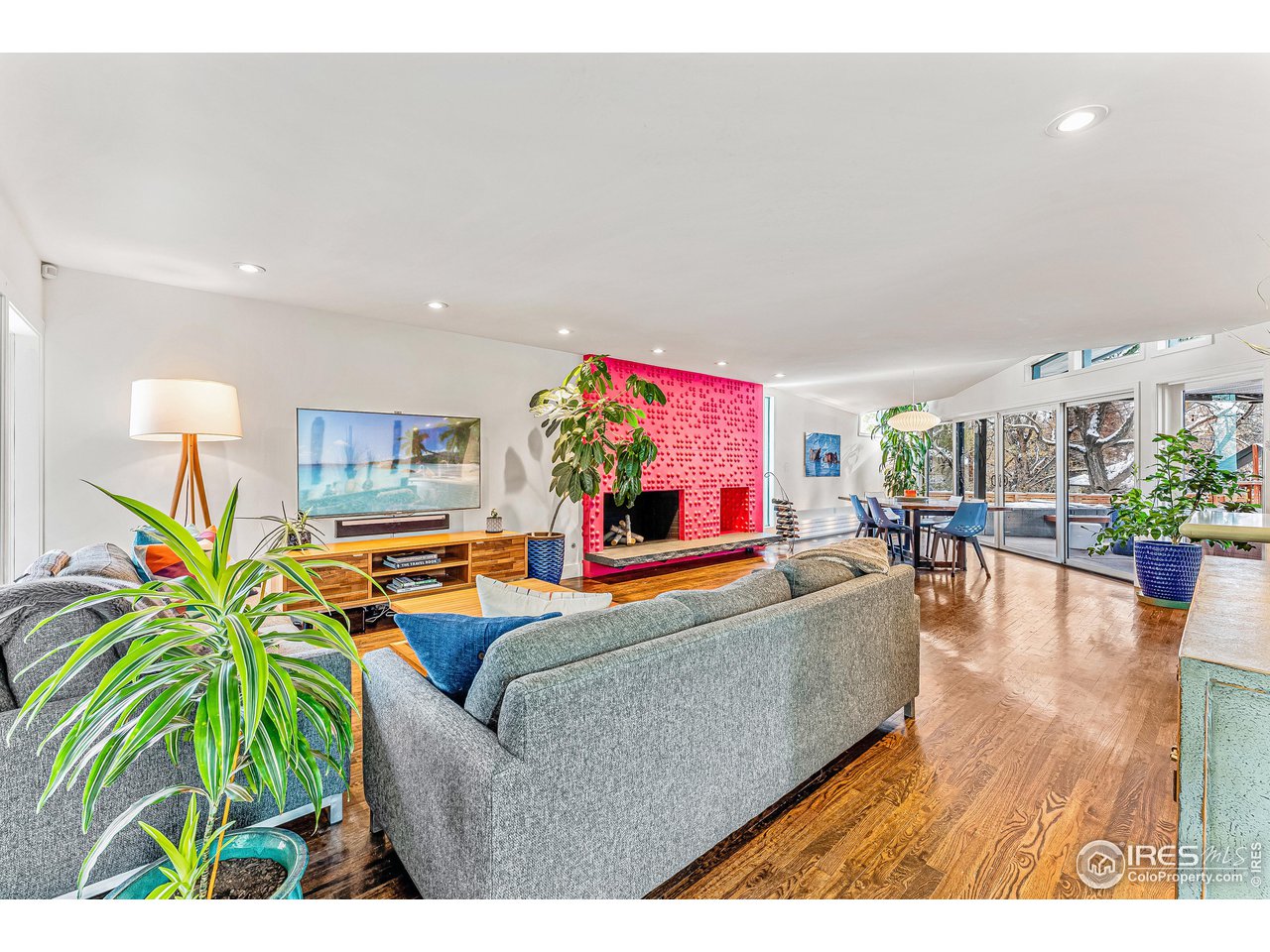 3560 9th Street Boulder, CO 80304 - Photo 8 of 39 a living room with furniture and a flat screen tv