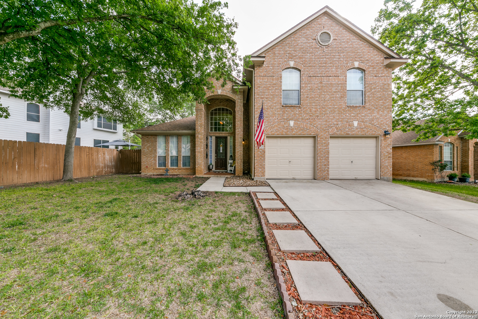 217 Turkey Tree Cibolo, TX 78108 - Photo 1 of 1 a front view of a house with garden