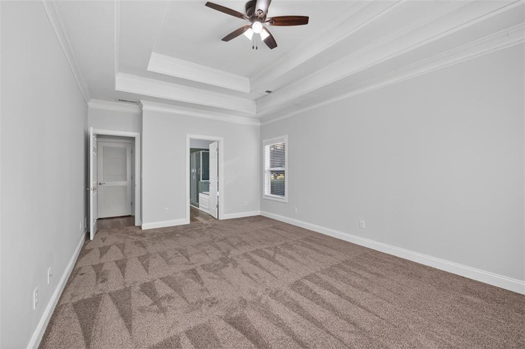 236 Reece Drive Hoschton, GA 30548 - Photo 15 of 58 a view of empty room with ceiling fan